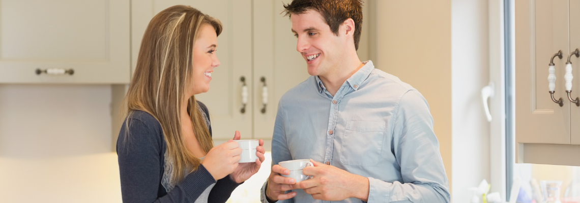 Couple drinking hot beverages